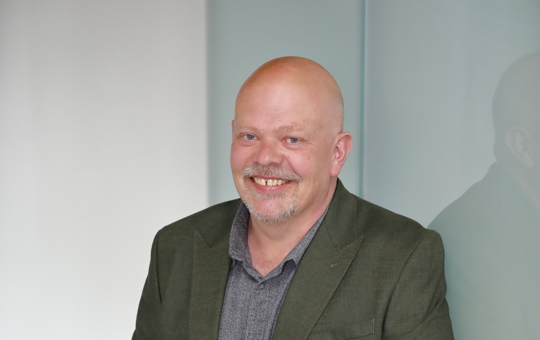 Blunden Prize winner Patrick Walls holding his award