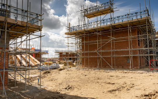 Building site with new build homes close to completion