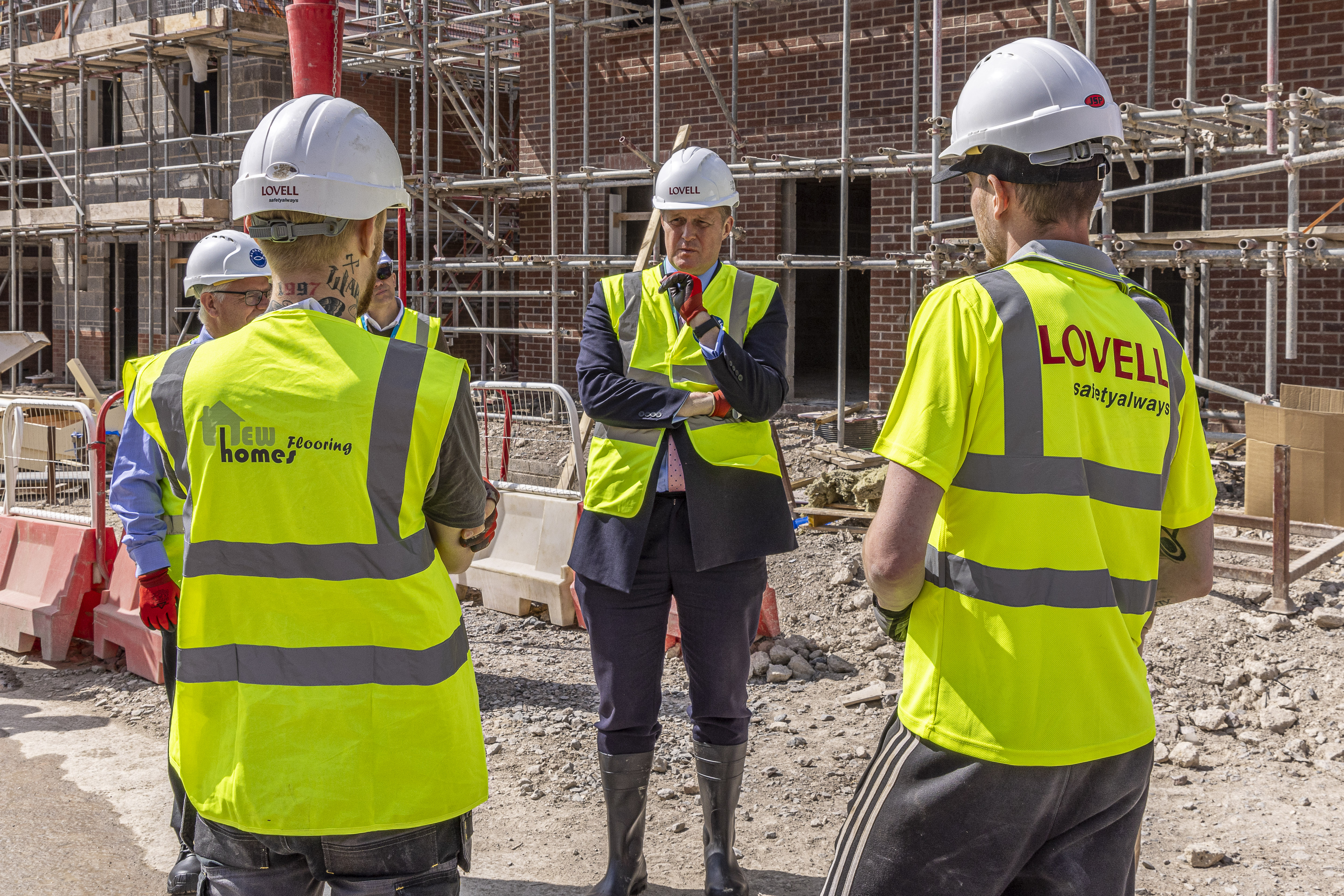 Councillor Clewer talking to site workers on Drummond park development site