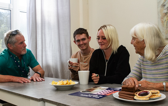 Counciller Les Fry and Stella Jones talking to resident at Dorchester Young People's Service