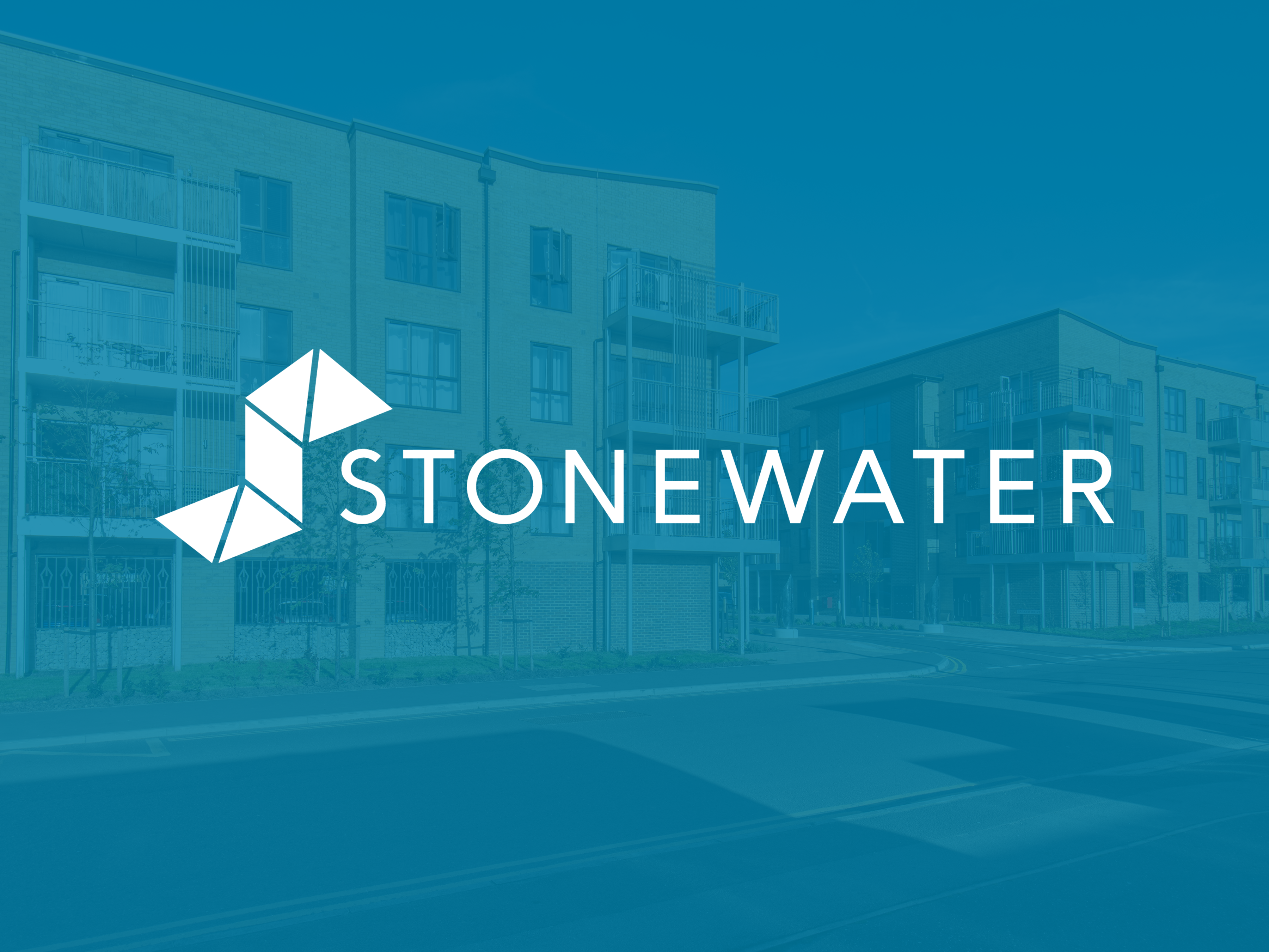 Stonewater logo super-imposed over street shot of new-build properties