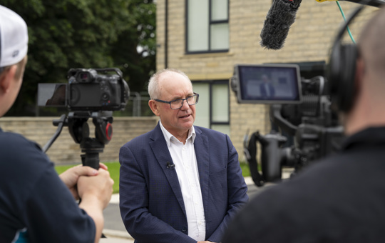 CEO, Nick Harris, giving a speech on camera