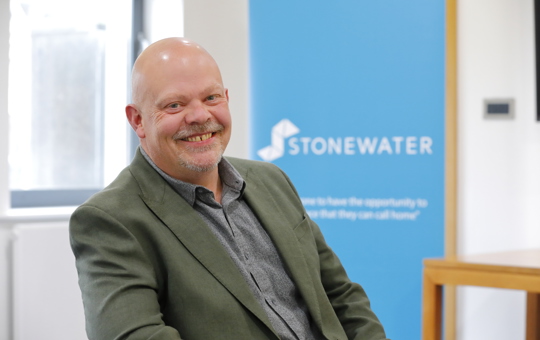 Blunden Prize winner Patrick Wells smiling at camera